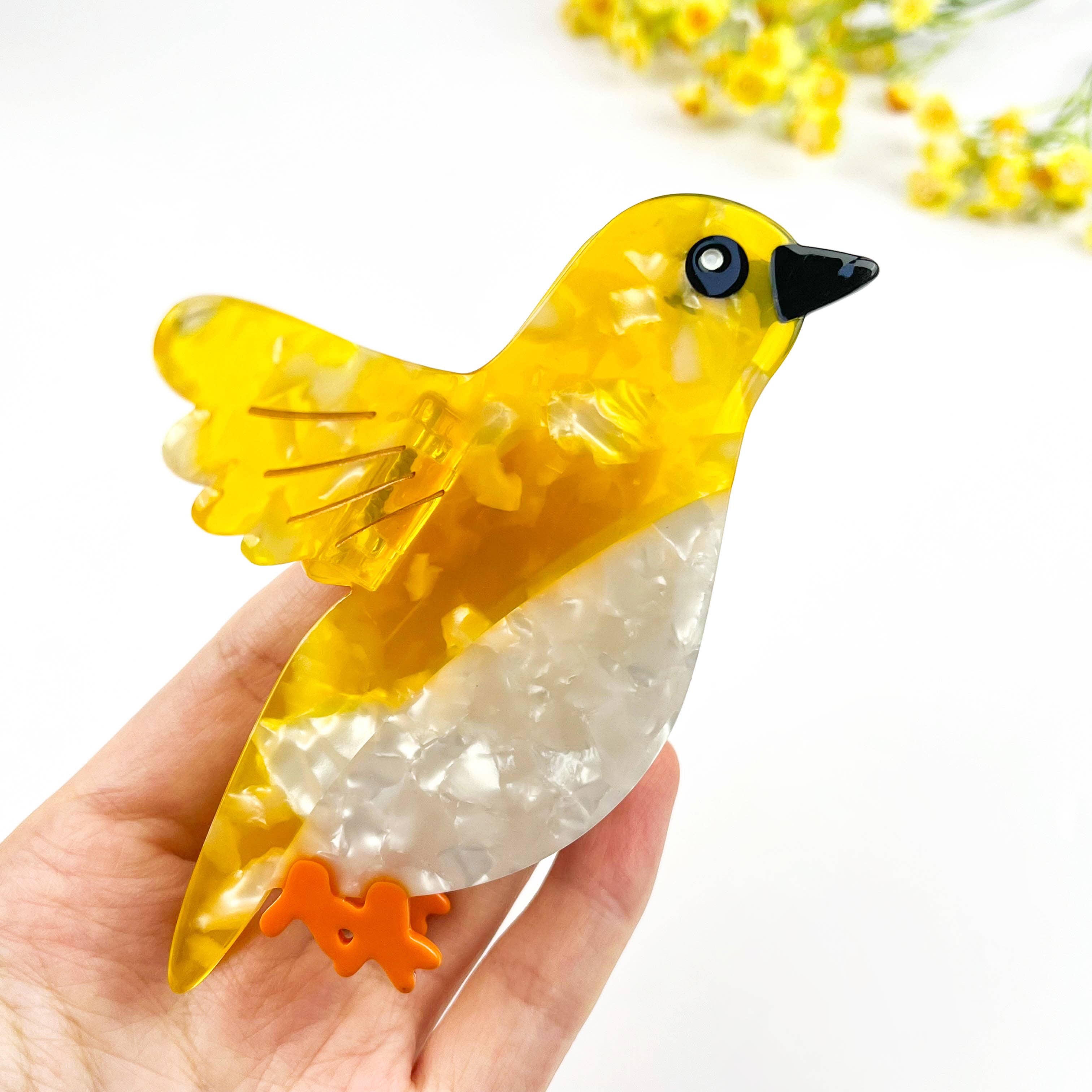 Flying Yellow Oriole Acetate Animal Hair Claw Clip for wholesale on Faire1