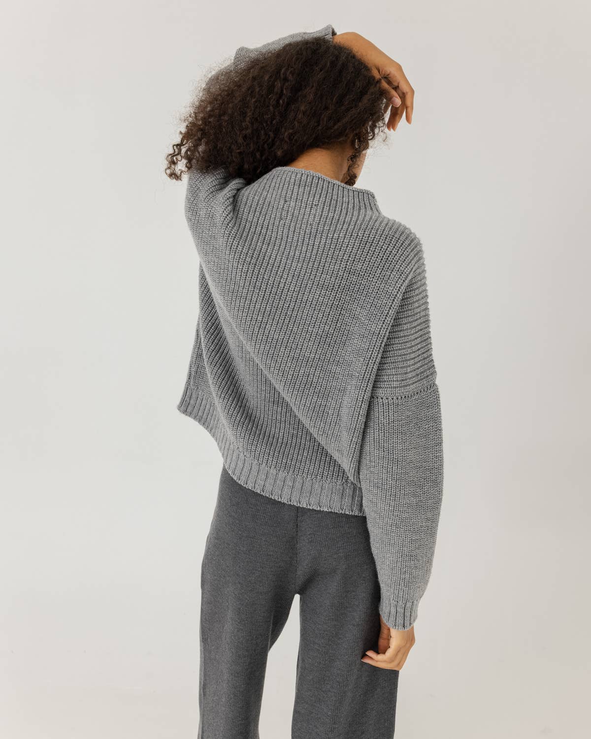 Laumės Sweater: Fog Gray 100% Merino Wool Sweater for wholesale on Faire1