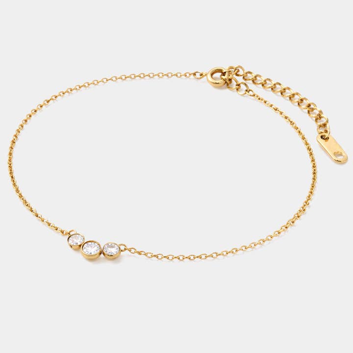 Golden bracelet in stainless steel with cubic zirconia trio - SS253B019GL pour la vente par Bizou