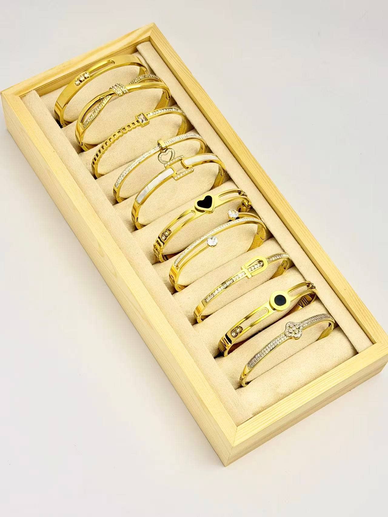 COSMOS - Wholesale Jewelry Set - Set of 10 elegant stainless steel bracelets on display0