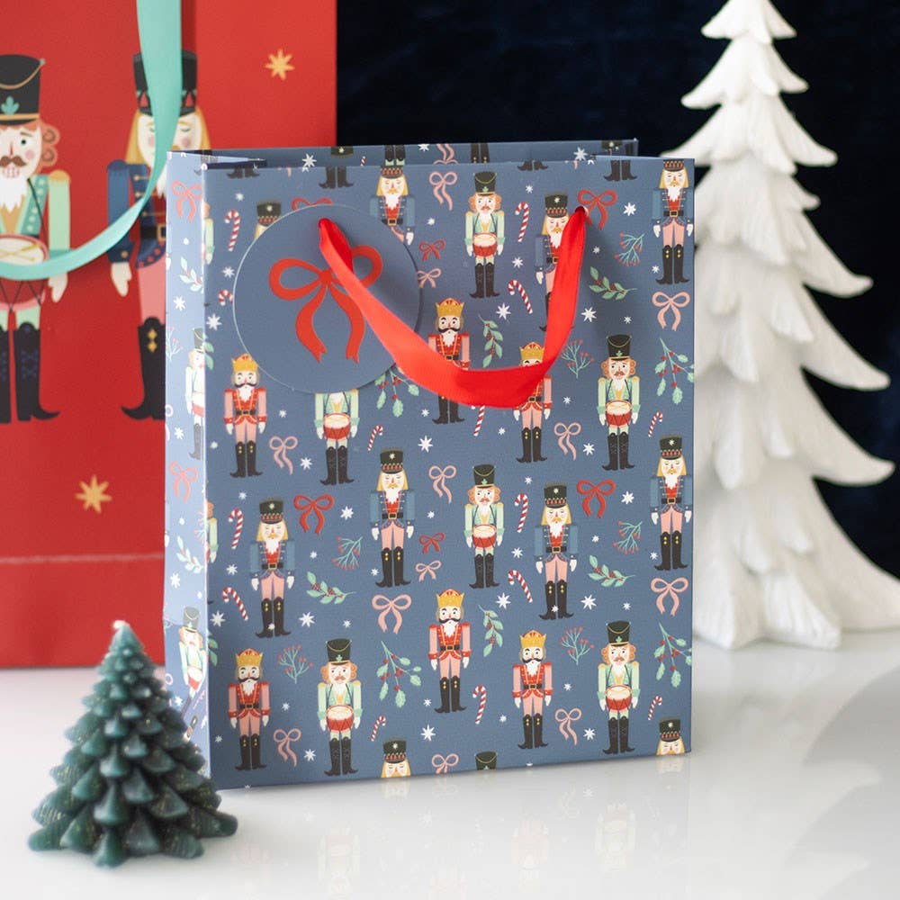 Something Different Wholesale – wholesale Gift bag – 23cm Medium Blue Christmas Nutcracker Print Gift Bag0
