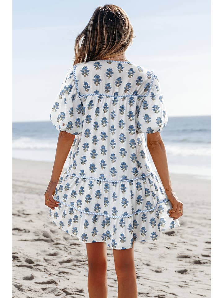 As shown Floral Puff Sleeve Tied Neck Pocketed Mini Dress | S-XL for wholesale on Faire