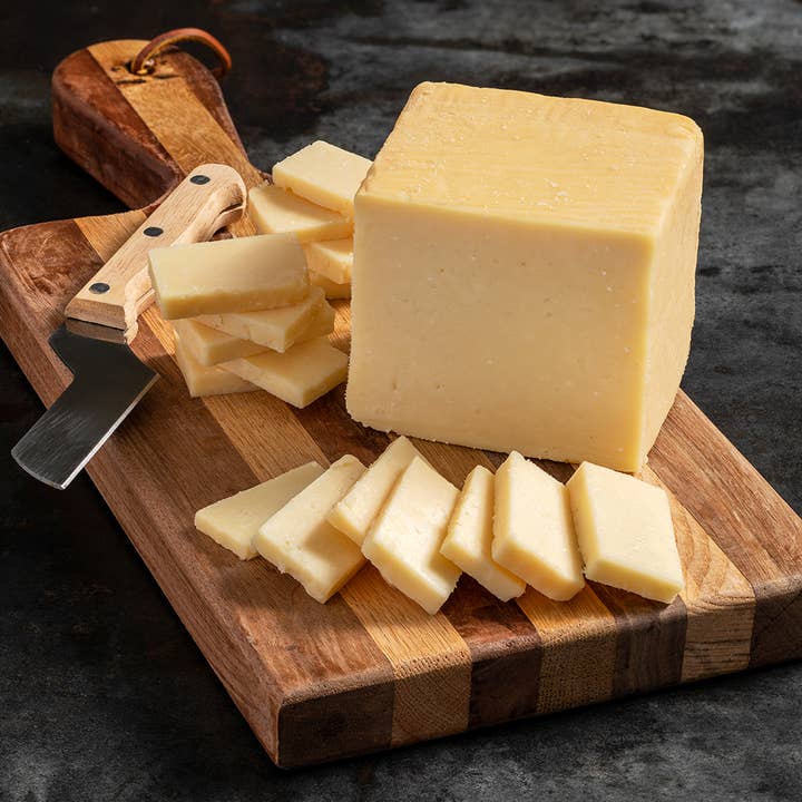 Goot Essa - Wholesale Cheese - Mountain Home Woodsmoked Cheddar Cheese