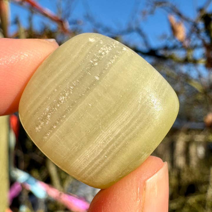 Banded onyx tumble 15-25mm green onyx gem polished stones UK for wholesale by Elf Kendal Hippies