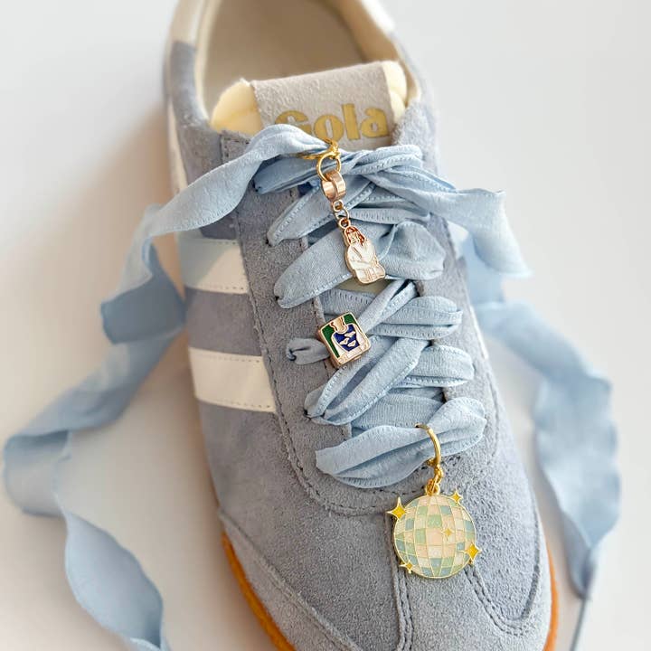 Leo & Lee Studio - Wholesale Charm/dangle bracelet - Swiftie-Inspired Shoe Charm Sets – Sneaker Charms4