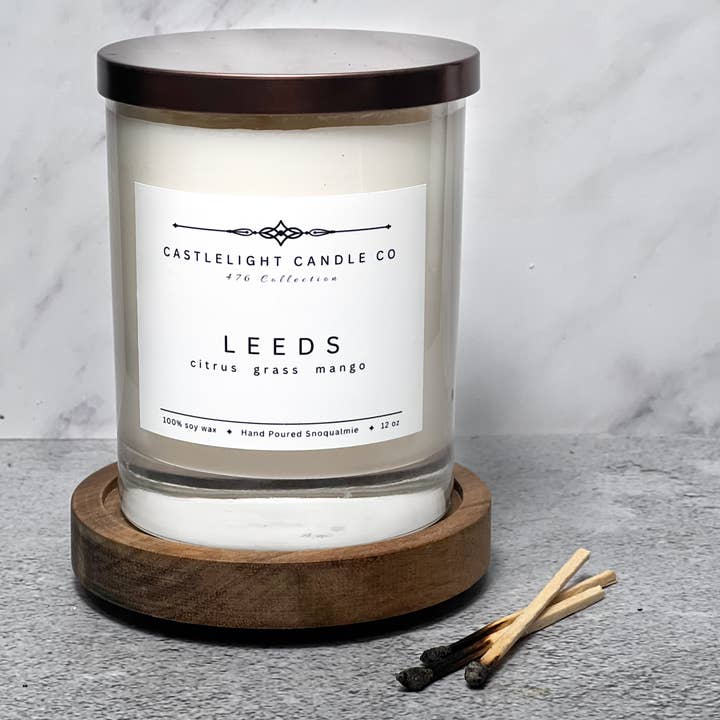 Leeds: Citrus + Mango 10 oz Clear Glass Soy Candle for wholesale by Castlelight Candle Co