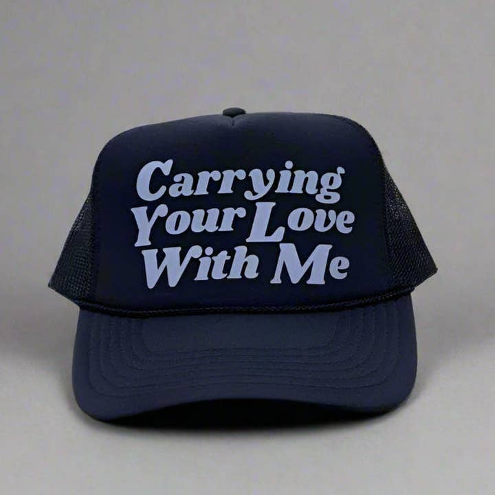 Carrying your Love Foam Trucker Hat for wholesale by Smokeshow Hat Company