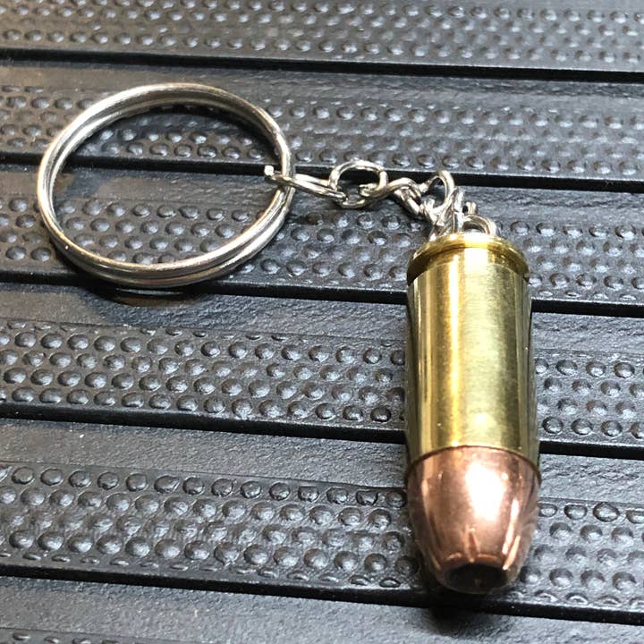 Real .40 Cal Hollow Point Bullet Keychain Gift. Unique! for wholesale by MB Designs