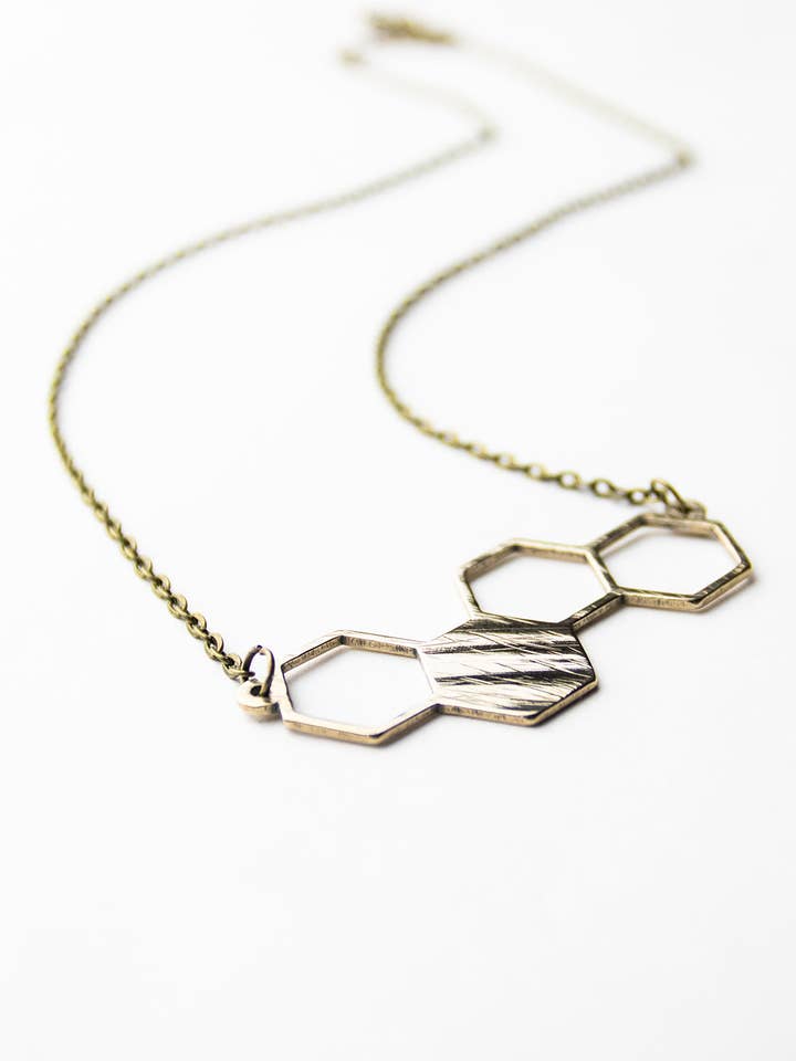 Hexagon - Reclaimed Cymbal Necklace for wholesale by Full Circle Co.