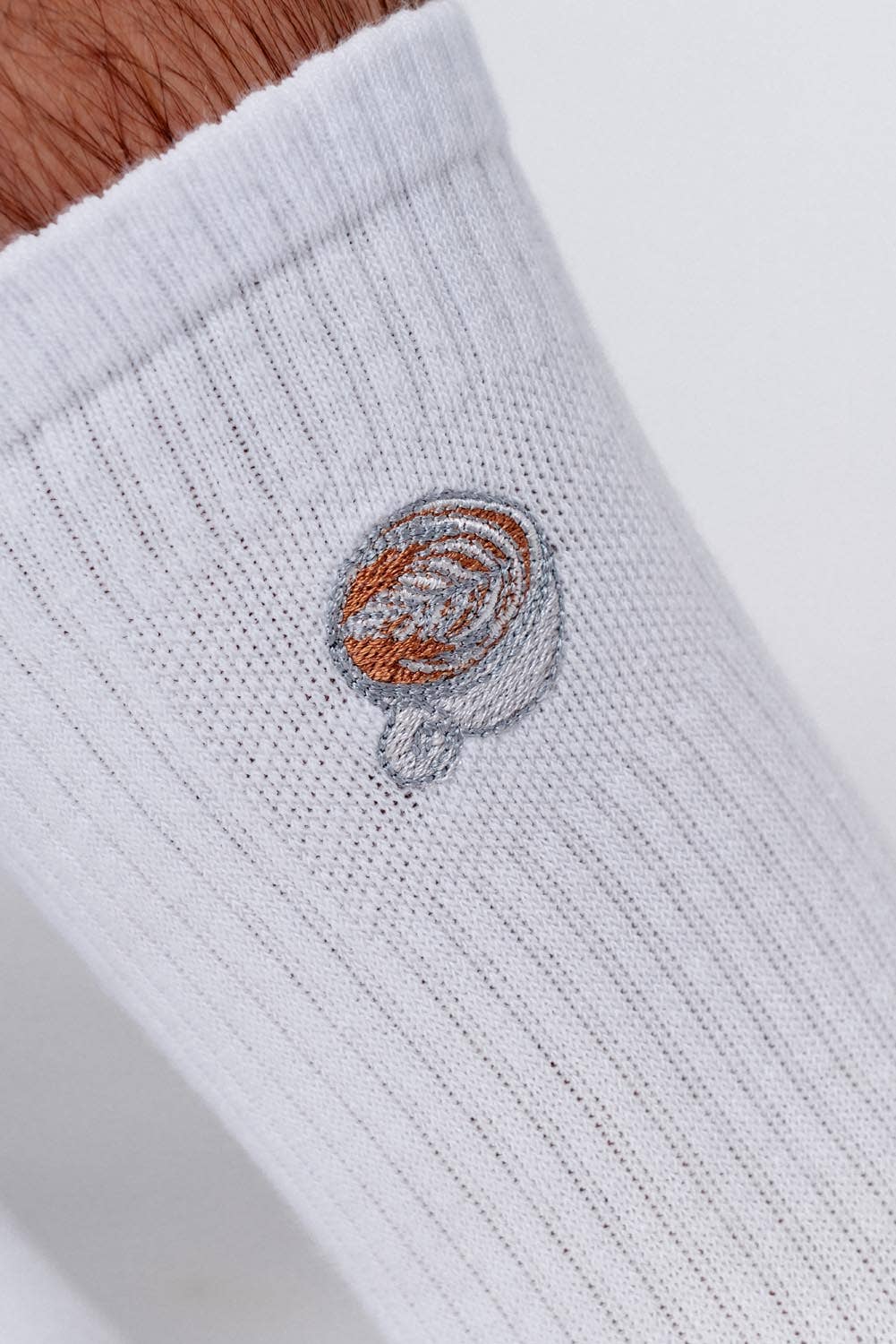 Flat White | Embroidered organic cotton socks for wholesale on Faire0