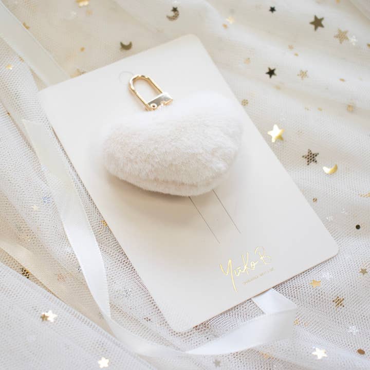 Pompom bag charm - Beige and other Purchase Wholesale pink pom poms. Free Returns & Net 60 Terms on Faire trending on Faire.