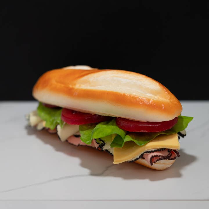 Just Dough It! Fake Foods – wholesale Decorative tabletop object – Fake Ham and Turkey on a Hoagie Roll Sandwich