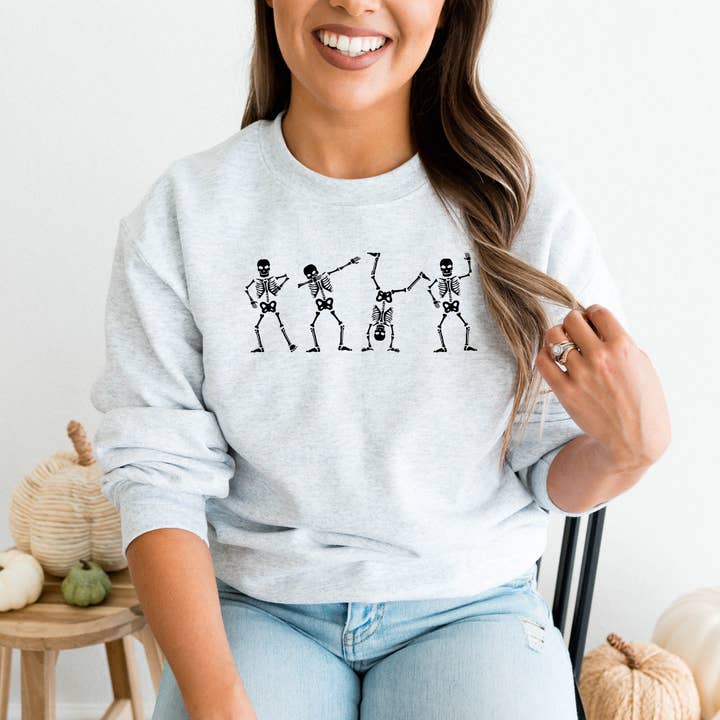 Sweatshirt met grafische print van Dancing Skeletons voor wholesale door Amber Marie Design