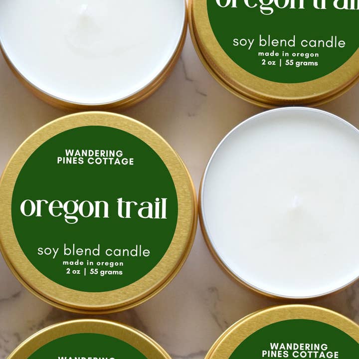 Oregon Trail - 2 oz Gold Tin Travel Candle for wholesale by Wandering Pines Cottage