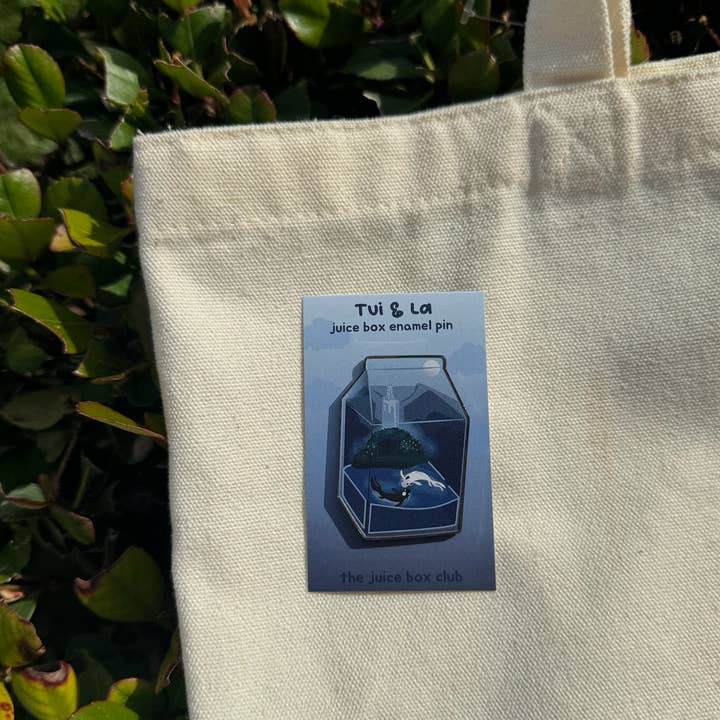 Tui & La Juice Box Enamel Pin for wholesale by The Juice Box Club