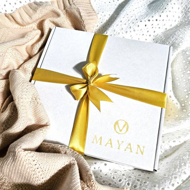 Packaged as a gift with a golden bow for wholesale by Mayan
