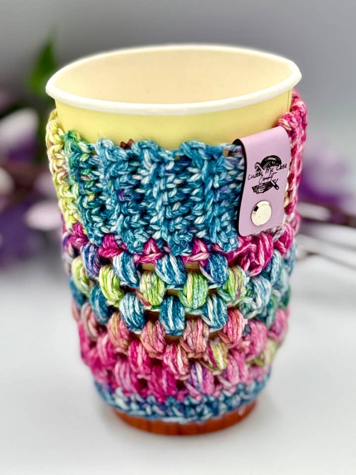 Pink, Green, and Purple Cup Cozy for wholesale by Cuddle Me Close Crochet