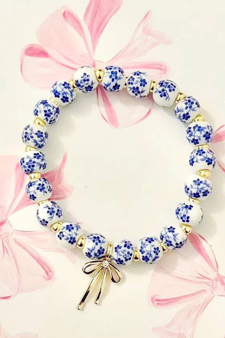 Gold Bogen-Charm Blumenporzellan Blaues Armband | 80B1355 für den Großhandel auf Faire1