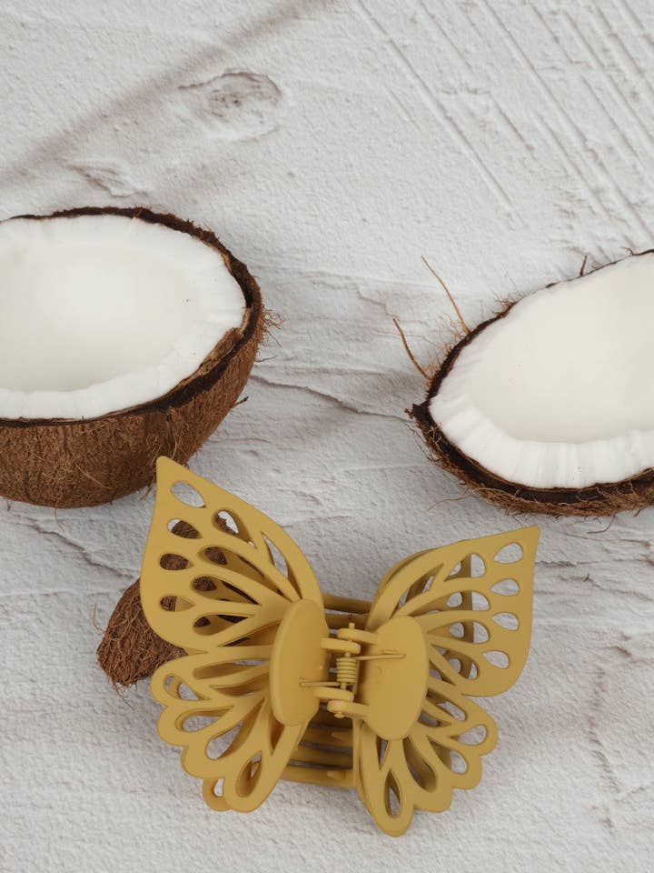 Klauenclip — Kleiner doppelter Schmetterling — Flachs für den Großhandel von Nakoa The Label