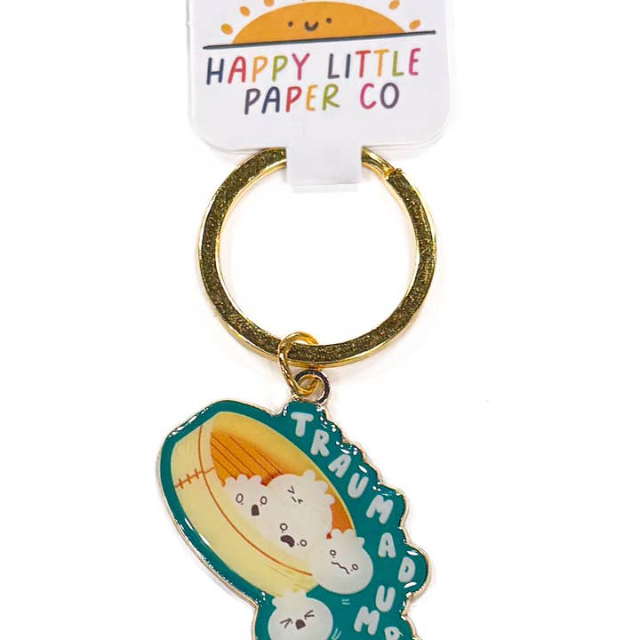 Trauma Dumpling Enamel Keychain for wholesale by Happy Little Paper Co