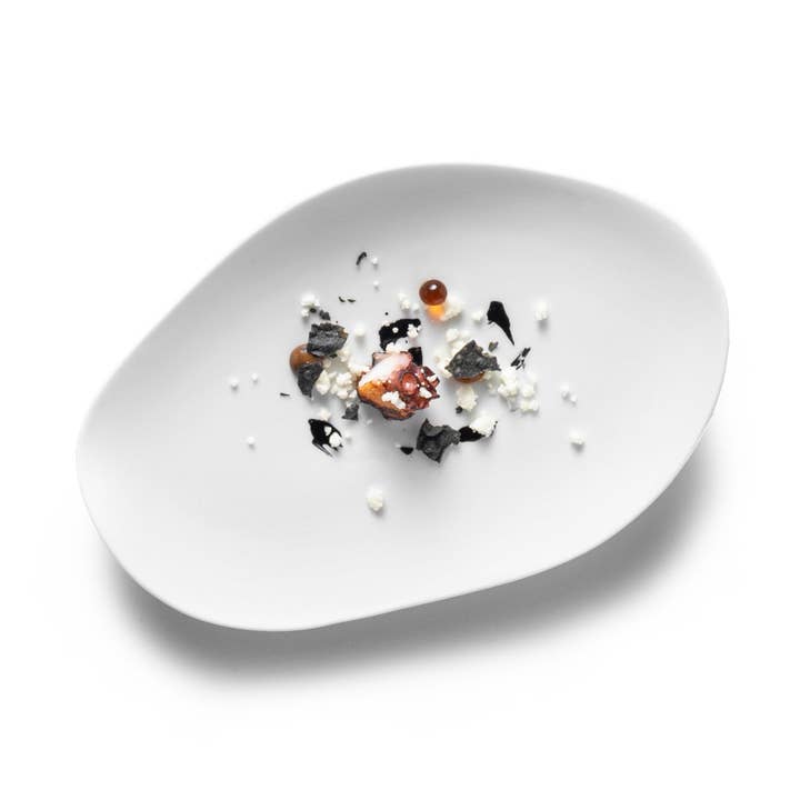 WAVE OVAL FLAT PLATE MAT 18X12 CM for wholesale by Catalonia Plates, Inc.