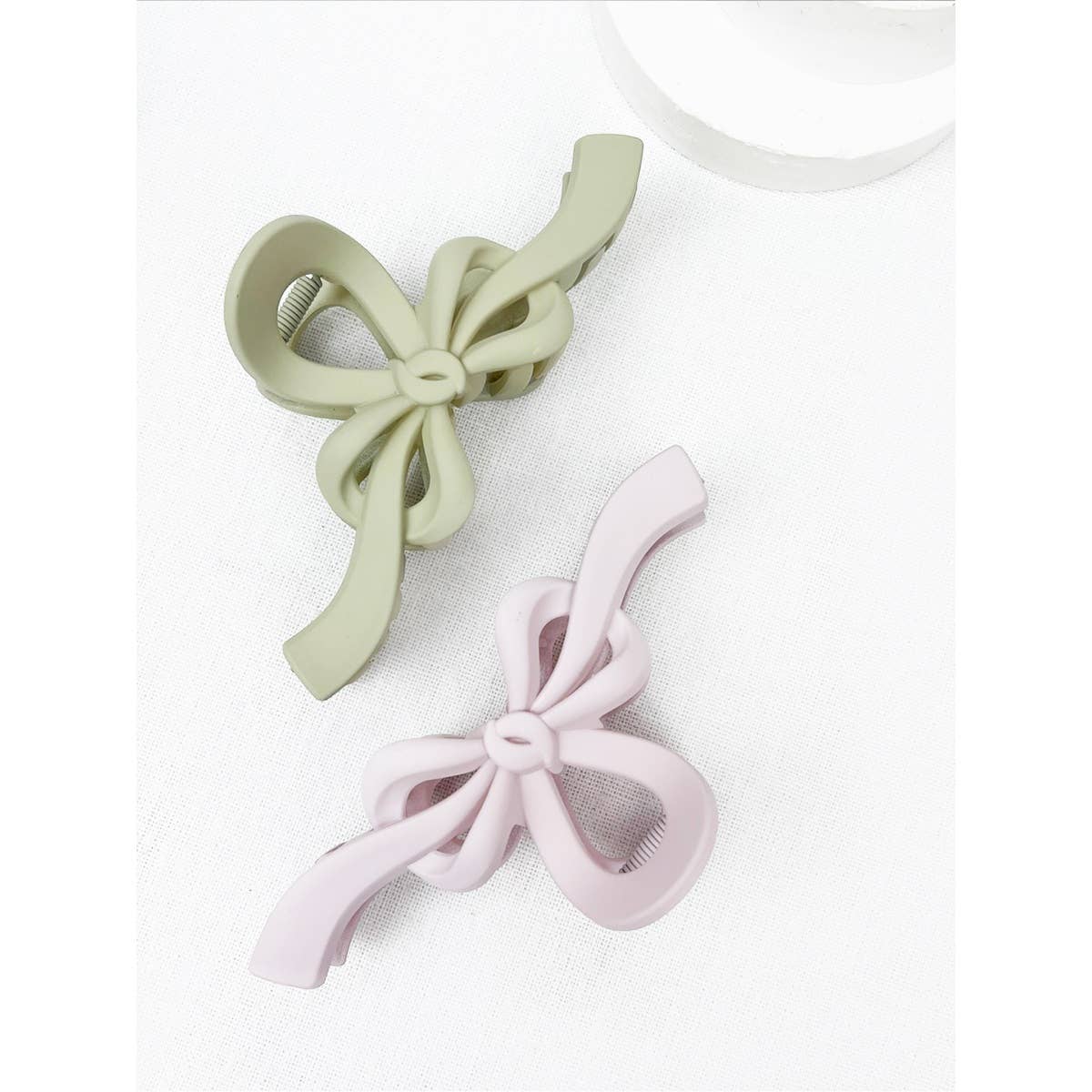 MIX COLOR Knotted Bow Soft Tone Matte Hair Claw for wholesale on Faire1