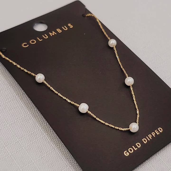 Gold-Dipped Pearl Station Necklace 93664 and other Purchase Wholesale faux pearls. Free Returns & Net 60 Terms on Faire trending on Faire.