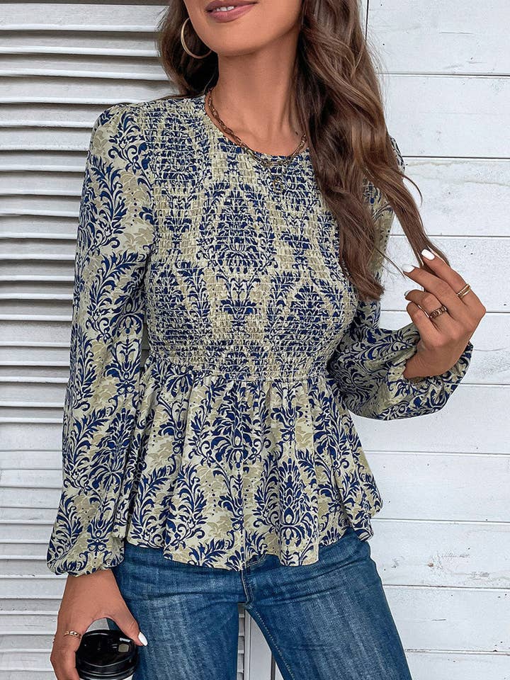 Blusa Boho Azzurra con Stampa, Maniche a Palloncino e Peplo Arricciato per la vendita all'ingrosso da parte di Lovesoft