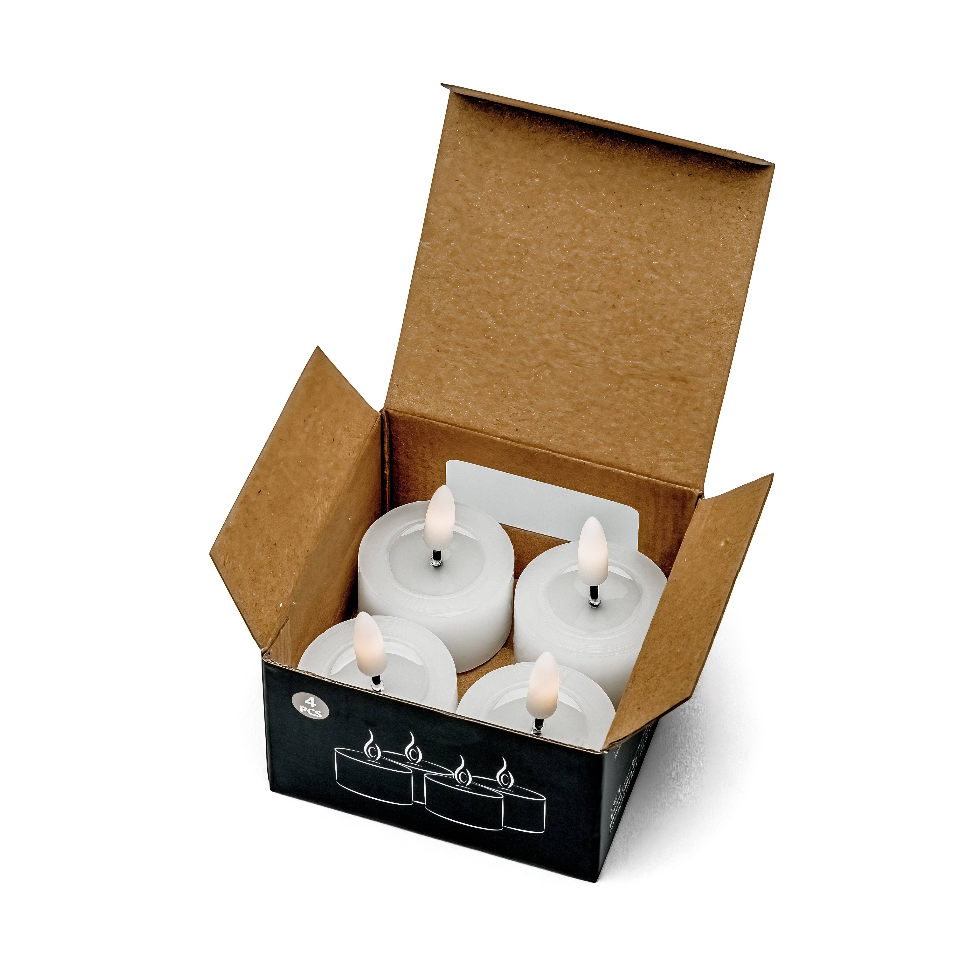 Set of 4 White Flameless Tealight Candles for wholesale on Faire2