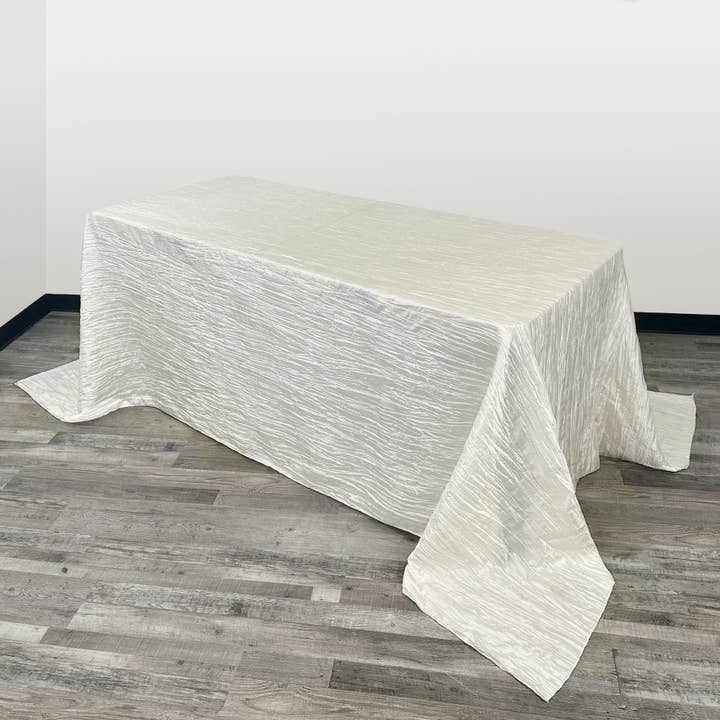90 x 156 inch Crinkle Taffeta Rectangular Tablecloth Ivory for wholesale by YOUR CHAIR COVERS
