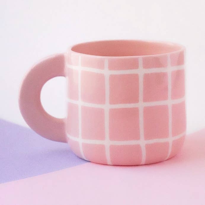 Pink porcelain mug with white grid for wholesale by Textura Ceramics