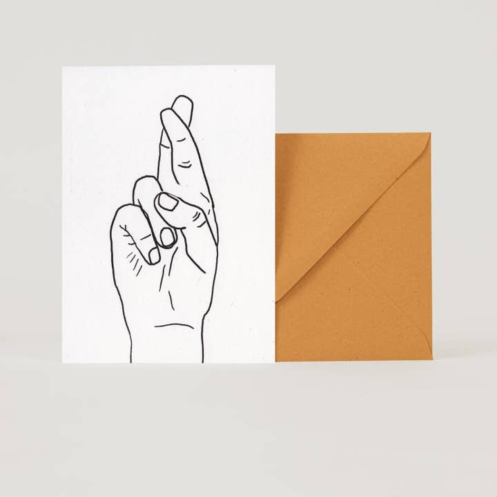 Doigts de cartes pliables croisés pour la vente par superjujupress