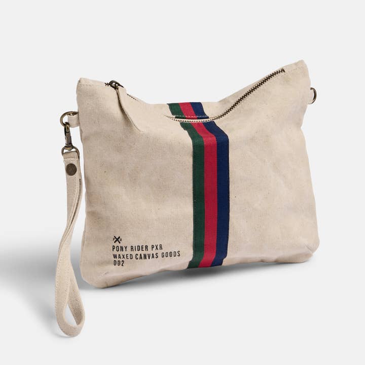 Summer 25 | Escapee clutch | Natural Waxed and other Purchase Wholesale canvas and leather bags. Free Returns & Net 60 Terms on Faire trending on Faire.