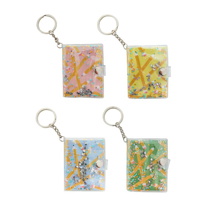 Smarty Pants Notebook Keychain - 4 Color Options and other Purchase wholesale globe keychain. Free returns & net 60 terms on Faire trending on Faire.