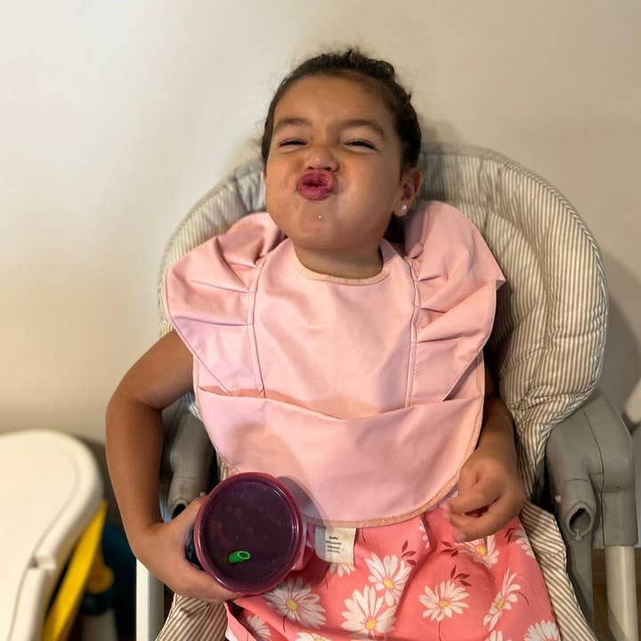 Wing Ruffle Waterproof Bib and other Purchase Wholesale ruffle bib. Free Returns & Net 60 Terms on Faire trending on Faire.