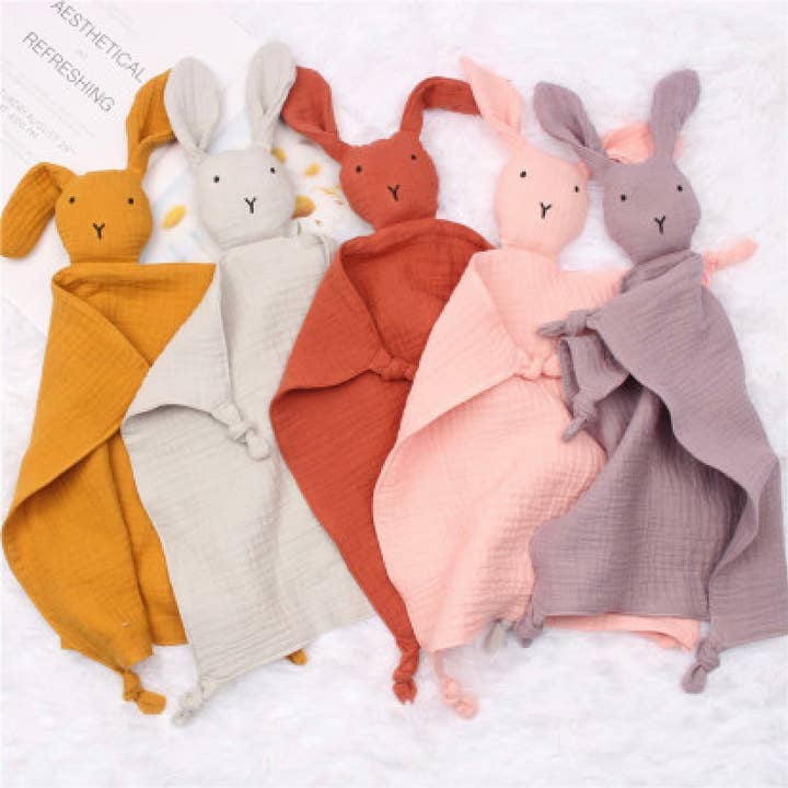 Annie & Charles® bunny cuddle cloth made of organic cotton and other Purchase Wholesale bunny blanket. Free Returns & Net 60 Terms on Faire trending on Faire.