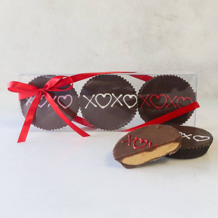 Valentine's 3pc XOXO Milk Chocolate Peanut Butter Cups for wholesale by Maggie Lyon Chocolatiers