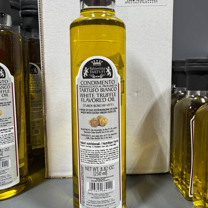 White Truffle EVOO 8.82 oz. (250ml) with Truffle Pieces for wholesale by Gusto Italian Foods LLC