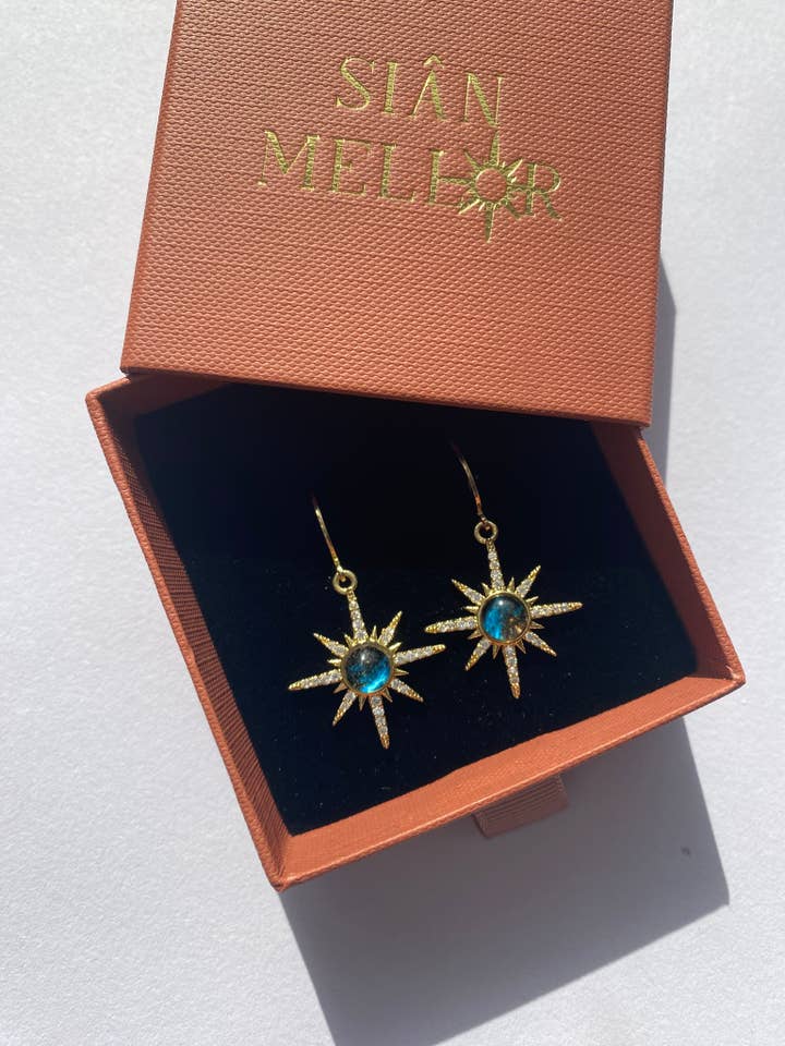 Large star huggie hoop earrings for wholesale by Sian Mellor