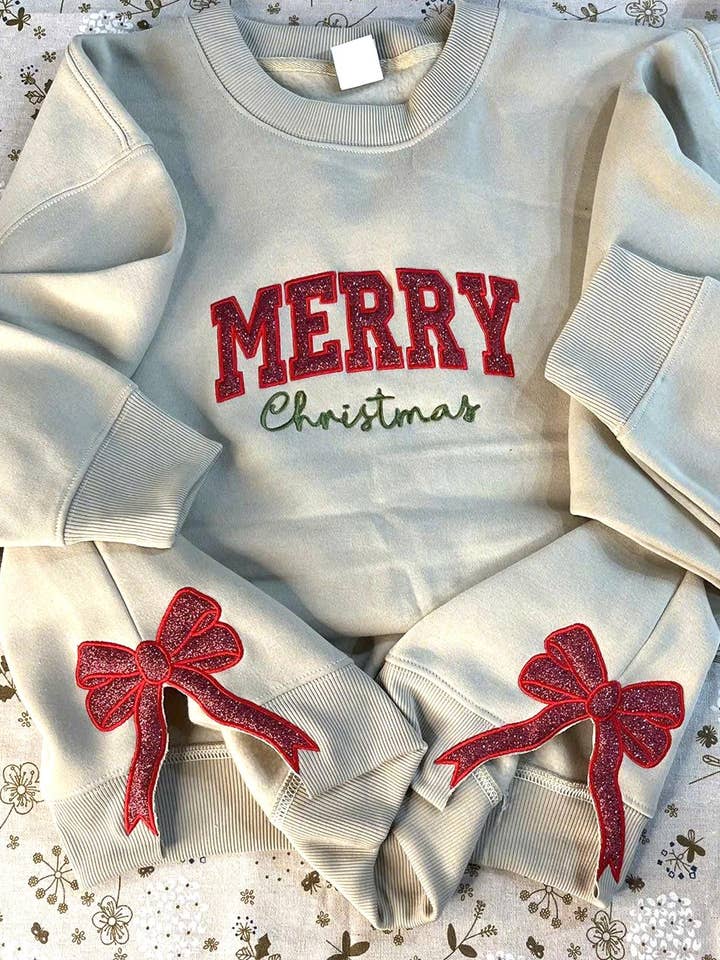 Glitter Merry Xmas Red Bow, Embroidered Side Bow Sweatshirt and other Purchase Wholesale christmas sequin sweatshirt. Free Returns & Net 60 Terms on Faire trending on Faire.