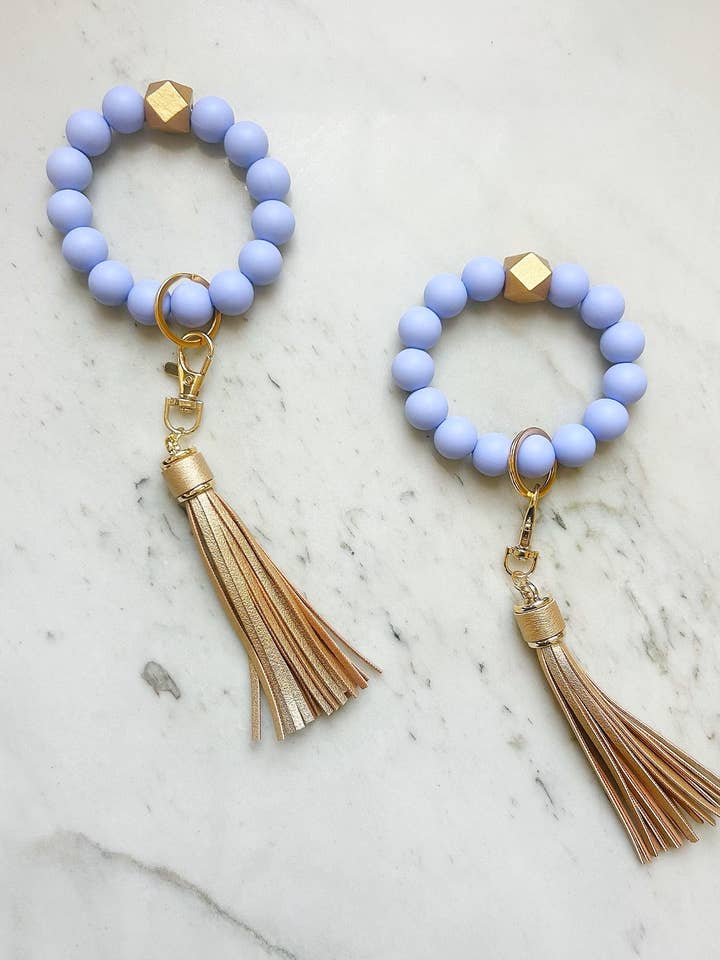 Solid Group: Sleutelhanger met maagdenpalmpolsband voor wholesale door Lanyard Lovebirds