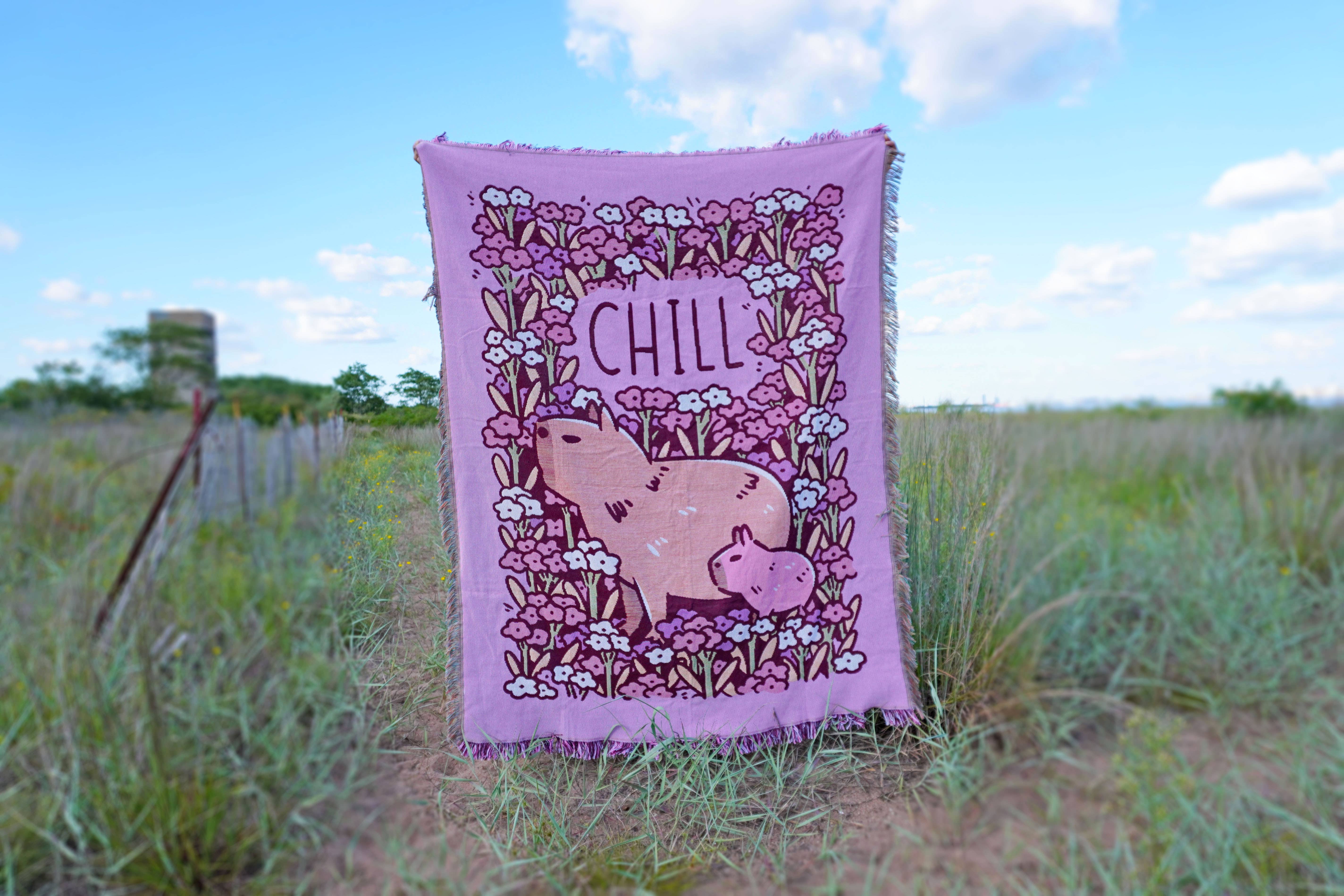 Noristudio - Wholesale Throw Blanket - "CHILL" capybaras and flowers woven blanket in pink1