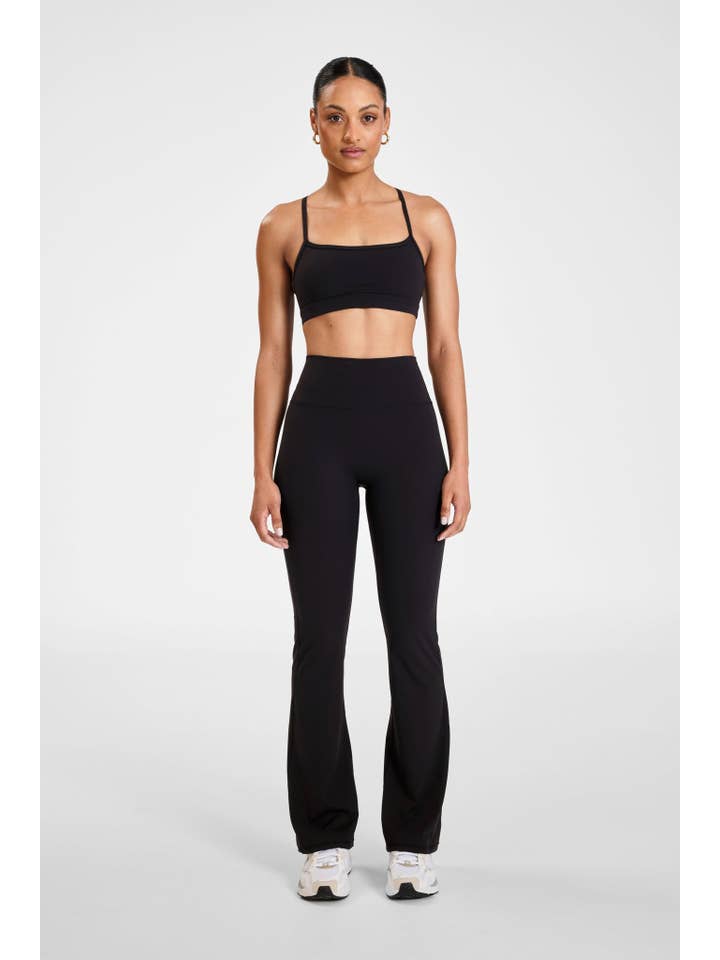 Black ALLFENIX CloudCore Flared Legging for wholesale on Faire