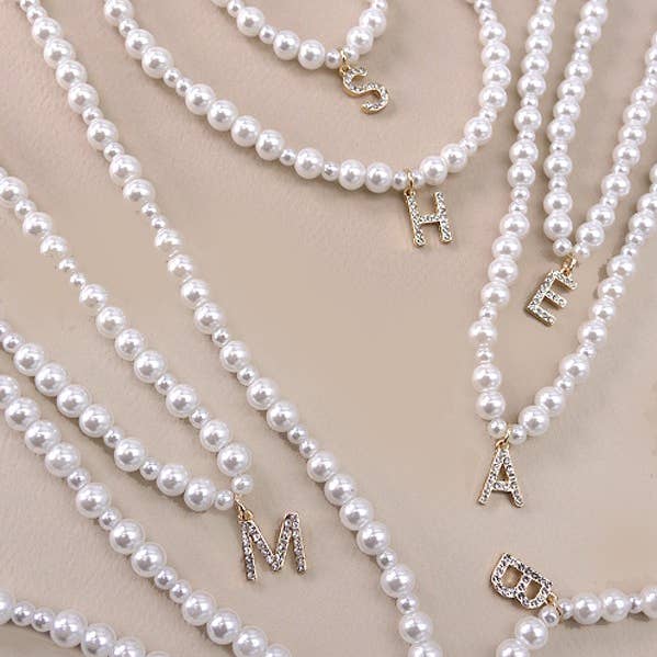 GLASS PEARL RHINESTONE INITIAL PENDANT NECKLACE | 10N31974 and other Purchase Wholesale pearl letters. Free Returns & Net 60 Terms on Faire trending on Faire.