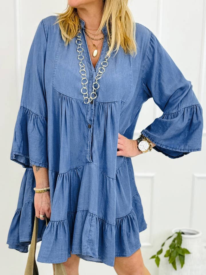 Chambray Ruffled 3/4 Sleeve Tiered Split V Neck Mini Dress and other Purchase Wholesale chambray dress. Free Returns & Net 60 Terms on Faire trending on Faire.