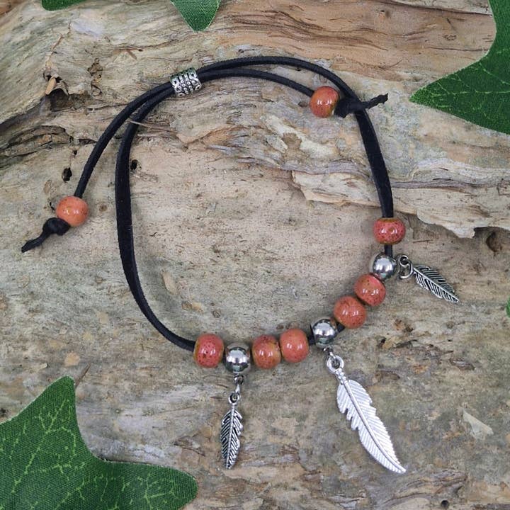 Sunbaked Lizard Jewellery & Gifts - Wholesale Charm/dangle bracelet - Beaded Feather Charm Bracelet - Pink | Ceramic bead bracelet2