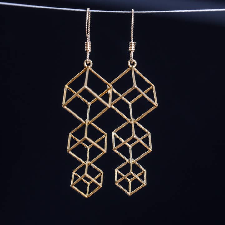 Dangling Cubes Earrings (Metal) for wholesale by Hanusa Design