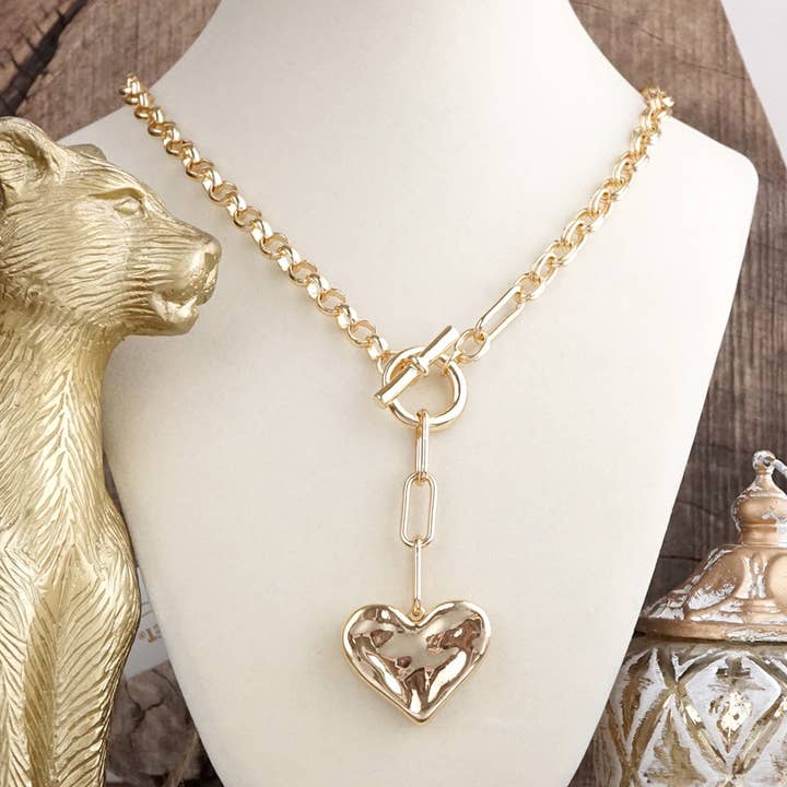 Heartline Glow – Hammered Heart Lariat Necklace in Gold for wholesale by PennyLine inc