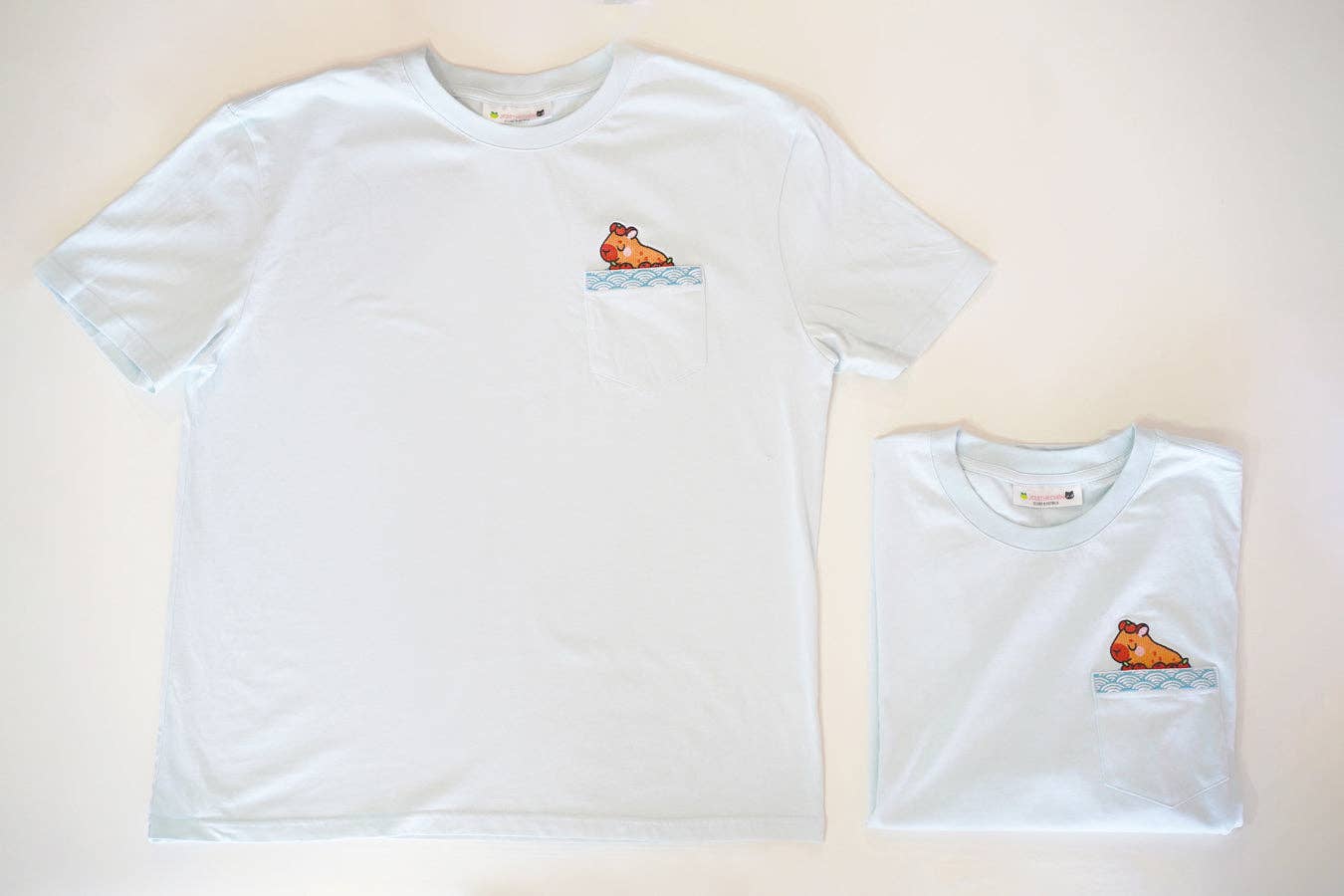 Jessthechen - Wholesale T-Shirt - Unisex - Bathing Capybara Embroidered Pocket Tee | Sky Blue4