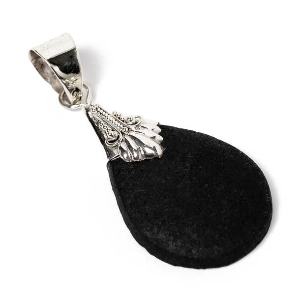 Lava Drop Pendant and Carved Paw for wholesale by El Expreso de Oriente